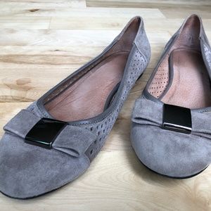 Gray suede flats with bow and metal detail